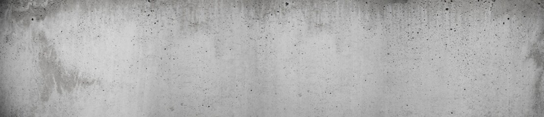 grunge concrete texture in old retro grey long format as panorama with dots holes and scratches in...