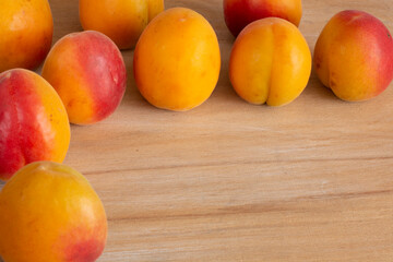 apricot berries on wooden background