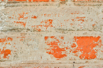 Texture of old brick with white paint, brickwork seam on a brick wall.
