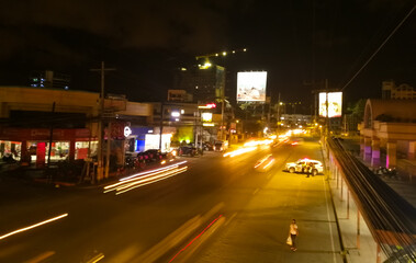 City street at night in motion blur lights.