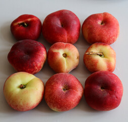 ripe juicy peaches on a white background close up