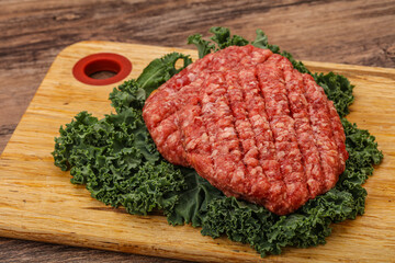 Raw beef burger cutlet for cooking