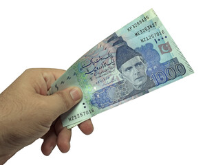 hand hold pakistani currency note