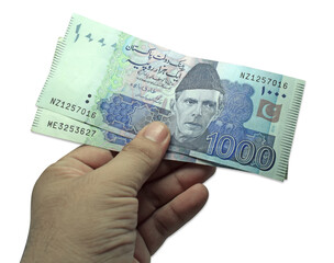 hand hold pakistani currency note