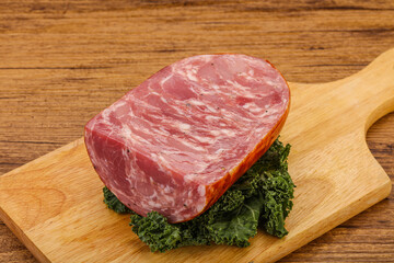 Beef ham piece over board