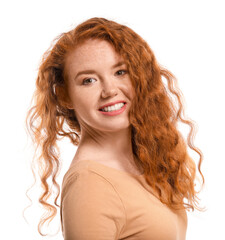 Portrait of beautiful redhead woman on white background