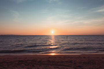 Sunset at the beach in the evening Holiday and Travel Concept