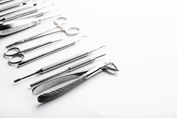 Different dental equipment with copy space on white background