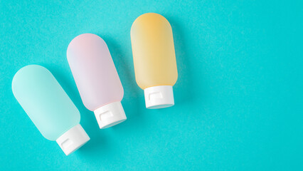 essential travel kit. toiletry kit. cosmetic bottles. small cosmetic travel containers for cream, shampoo, conditioner