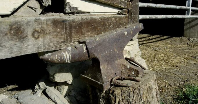 Anvil for horse shoes outside horse stables - close up