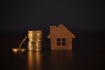 House and coins stack. Mortgage loading real estate property with loan money bank concept