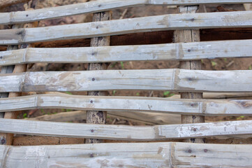 The balcony is made of old wood.