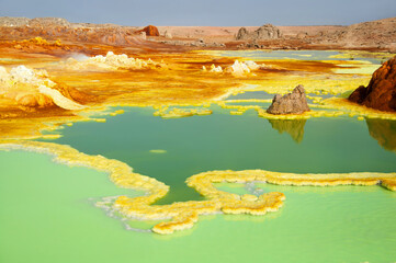 Colorful landscape of green acid ponds in Crater of Dallol Volcano the hottest place year-round on the planet located in Afar region, Danakil Depression, Northern Ethiopia