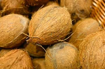 a pile of fruits coconut as background