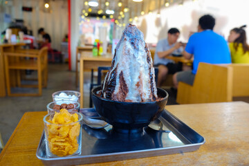 Chocolate bingsu with milk and fruit very delicious.