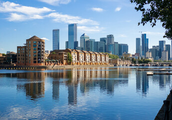 Panorama of Dockland Heritage reflected in the thames River in a sunny day in London - obrazy, fototapety, plakaty
