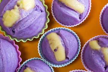 Ube puto with cheese. A Filipino style rice cupcake muffin with ube purple yam flavor. 