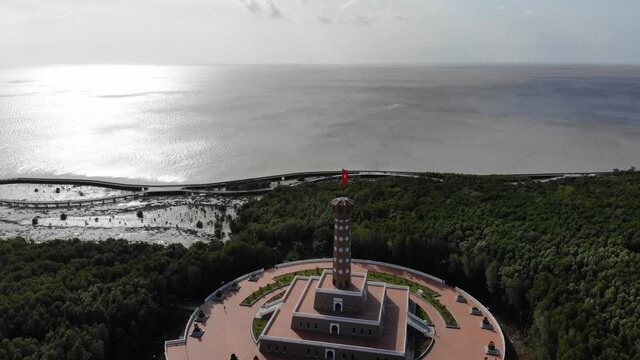 The replica of Hanoi Flag Tower in Ca Mau cape, Vietnam. Aerial footage.