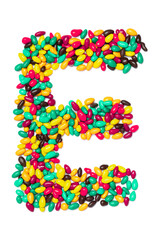 Letter E of the English alphabet  from multicolored round chocolates on a white isolated background. Food pattern made from children's candy. Bright alphabet for kids design