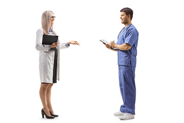 Female and male doctor having a conversatio