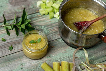 Rhubarb cooking process. Rhubarb jam. Made from rhubarb, sugar and mint