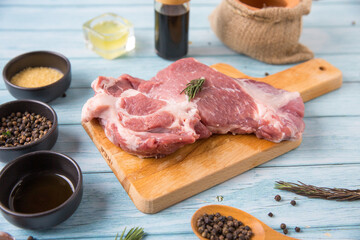 Raw pork on the wood floor