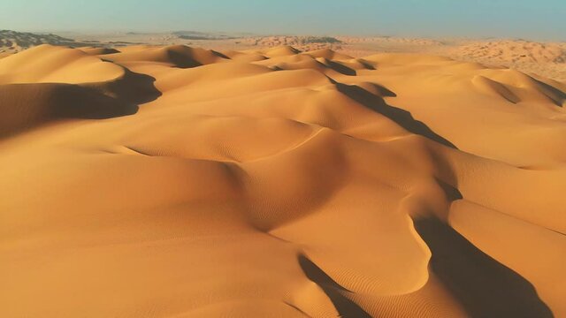 Rub' al Khali (Empty Quarter), Arabian Peninsula. Flying over sand dunes in desert. Aerial shot