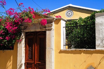 Fototapeta na wymiar Greece, Symi island, old traditional houses in Ano Symi town.