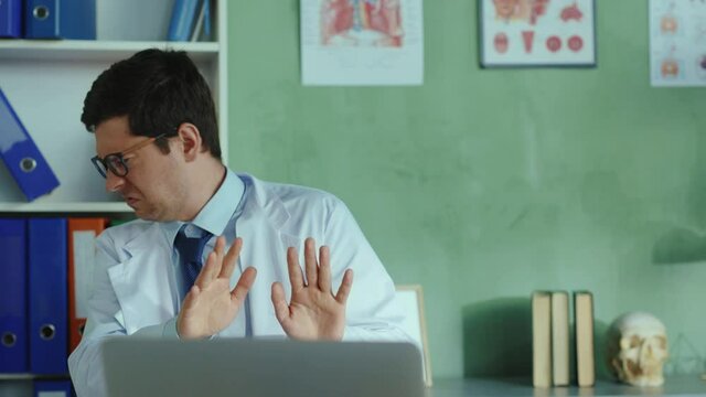 Unhealthy female patient coughing sneezing allergy in front of doctor. Scared therapist leaning back screwing up face avoiding spread of infection. Concept for mysophobia.