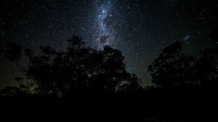 Fototapeta na wymiar The Milky Way in the mountains of the Grampians National Park in Victoria, Australia at a clear starry night in summer.
