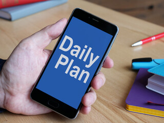 Daily Plan is shown on the conceptual business photo