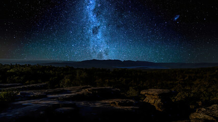 Naklejka na ściany i meble The Milky Way in the mountains of the Grampians National Park in Victoria, Australia at a clear starry night in summer.