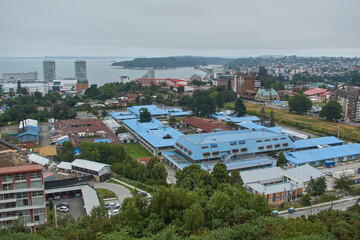 Fototapeta na wymiar PUERTO MONTT, CHILE - FEBRUARY 10, 2020: Panoramic view of Puerto Montt, Lake District, Chile. Big cruise in the bay.