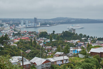Naklejka na ściany i meble PUERTO MONTT, CHILE - FEBRUARY 10, 2020: Panoramic view of Puerto Montt, Lake District, Chile. Big cruise in the bay.