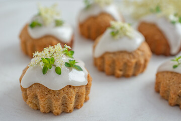 home made elderflower lemon cupcakes on a table