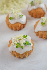 home made elderflower lemon cupcakes on a table