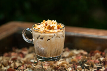 coconut coffee float on table in garden for relax time