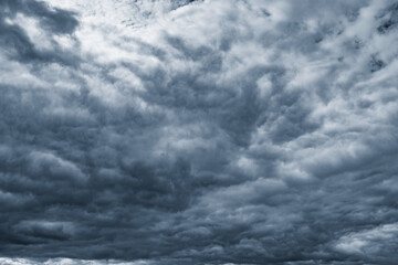 Dark storm clouds before the rain at day time.
