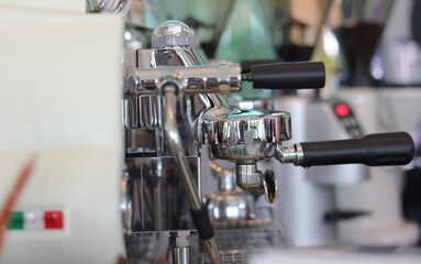 Close up of coffee holder. Professional coffee machine. Bistro or restaurant.