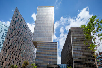 skyscrapers with clouds in sky, Barcelona, Spain