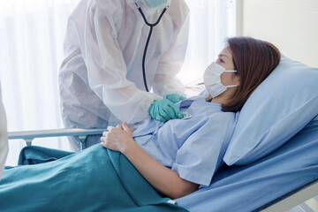 doctor working with woman patient