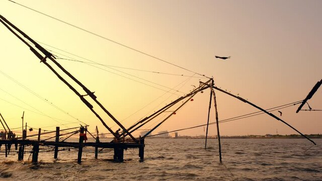 Chinese Fishing nets at sunset in Fort Kochi, Kerala state, India