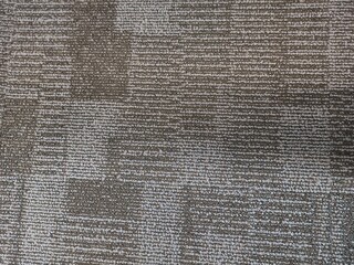 Grey office carpet pattern interior. Ash color fabric background