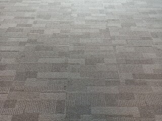 Grey office carpet pattern interior. Ash color fabric background