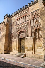 Decorated door and wall of the mosque cathedral in Cordoba, Spain