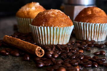 Muffins with coffee beans and cinnamon stick
