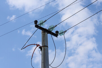 Closeup of the disk insulators made of hardened glass on a power transmission line