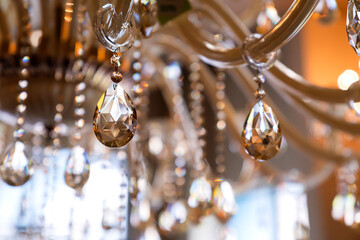 Chrystal chandelier close-up. Glamour background with copy space