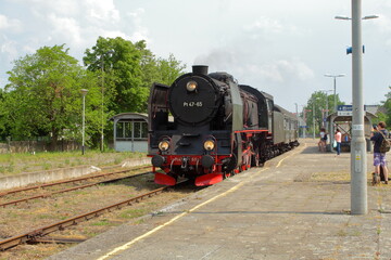 Fototapeta na wymiar steam locomotive at the station
