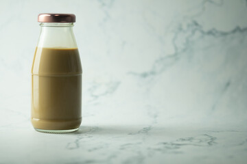 Cool coffee mocha in glass bottle